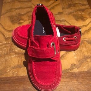 Red toddlers Nautica shoes.